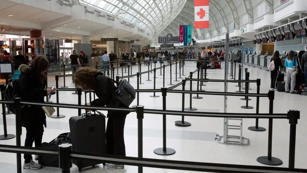 Elderly passenger restrained Toronto Pearson Airport open aircraft door mid-flight