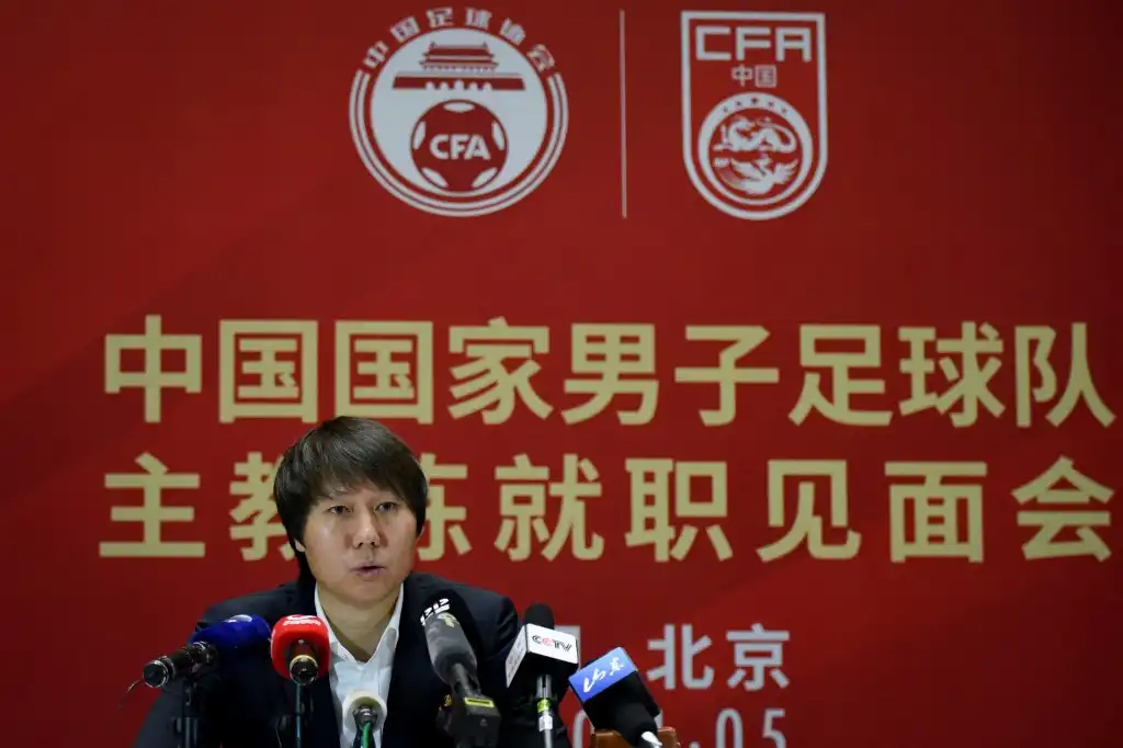 Former China football coach admits to paying bribes for job in TV confession