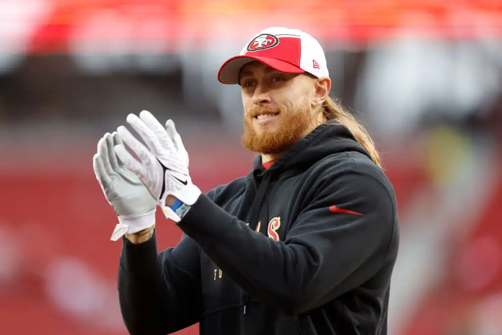 George Kittle 49ers playoff game outfit: Halo's Master Chief, Calvin and Hobbes, Godzilla
