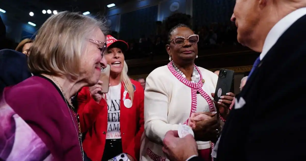 Marjorie Taylor Greene confronts Biden during State of the Union and hands him a button
